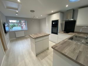 Refurbish kitchen with wood floors and counter tops in Basingstoke